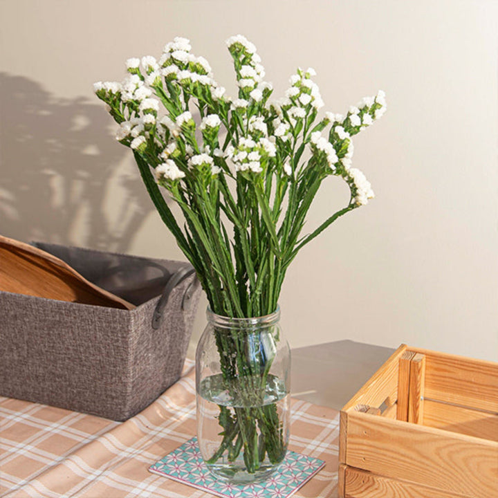White statice flowers on 10 stems from SQ Flora Kenya, showcasing delicate, vibrant blooms ideal for floral arrangements.