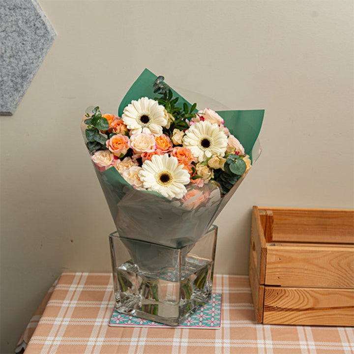 Colorful Sunshine Joy bouquet with 13 mixed flower stems, arranged in a vibrant floral bouquet by Mix Flower Bouquet.