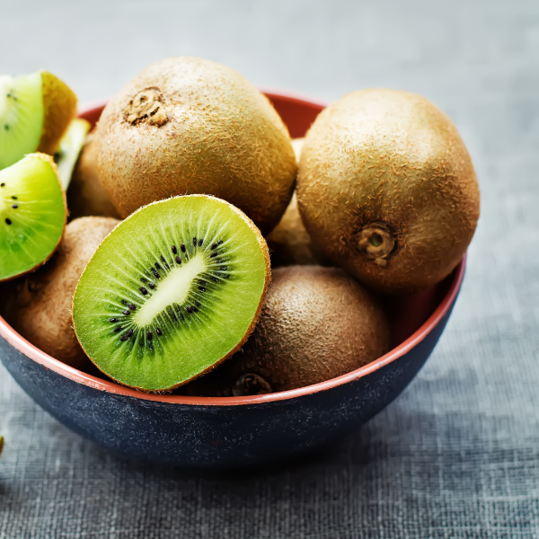 Fresh green kiwifruits in a 1 kg pack from Sharbatly, showcasing vibrant, ripe fruits ready to eat.