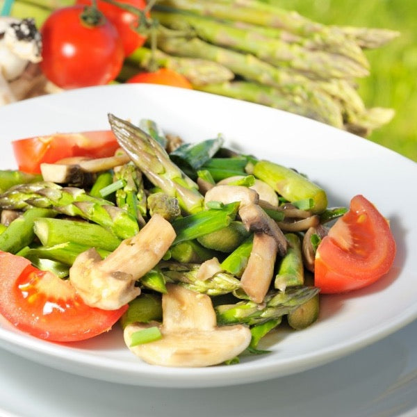 Fresh green Thai asparagus vegetable pack from Thailand, with vibrant spears arranged in a 0.1 kg bundle.