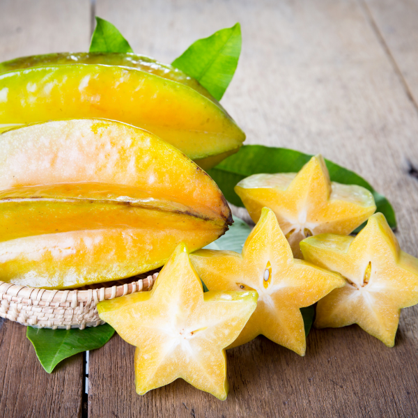 Fresh starfruit from Holland in a 400g pack, showcasing vibrant yellow-green tropical fruit with star-shaped cross sections.