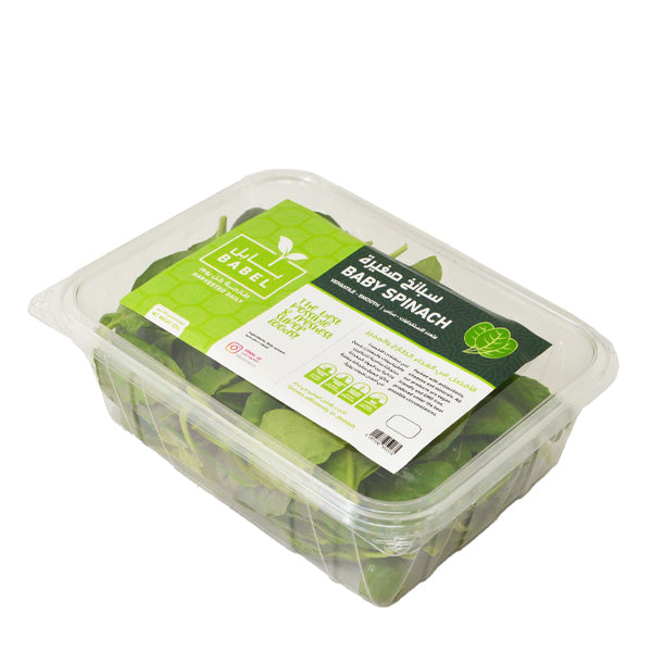 Fresh baby spinach in a 0.125 kg hydroponic vegetable pack from Babul, showing vibrant green leafy baby spinach.