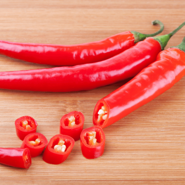 Red cayenne pepper chili vegetable from Local Market, 0.25 kg, fresh spicy red peppers in a natural setting