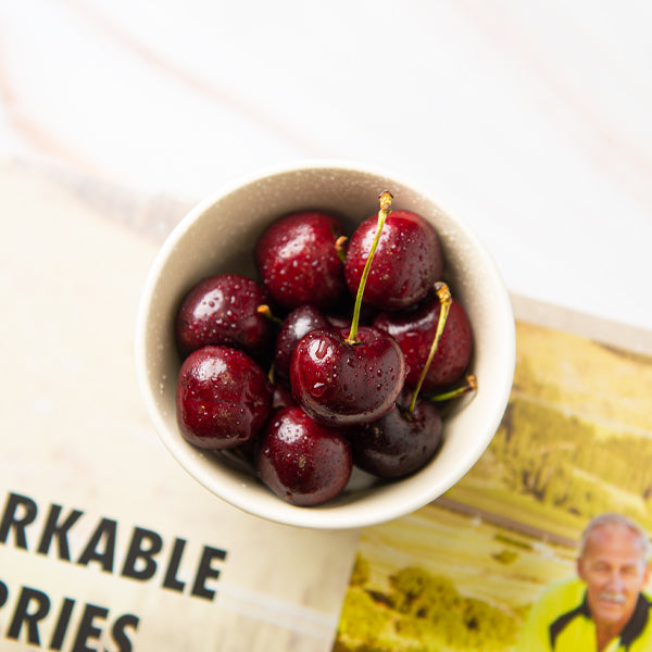 Fresh, bright red cherries from Sharbatly in a 0.25 kg pack, showcasing their glossy, ripe appearance and natural sweetness.