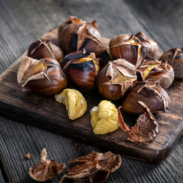 Fresh Sharbatly chestnuts in a 0.4 kg pack, whole and unpeeled, ready for roasting or cooking.