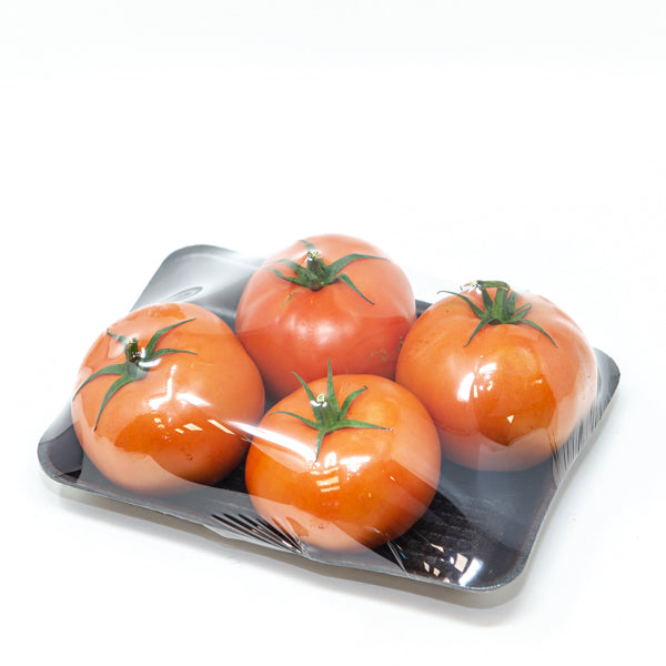 Fresh Dutch beef tomatoes in a 1 kg pack, showcasing vibrant red vegetables from Holland.