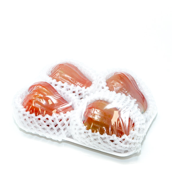 Fresh Thai wax apples, also known as rose or Java apples, displayed in a 0.5 kg pack, vibrant and ready to enjoy.