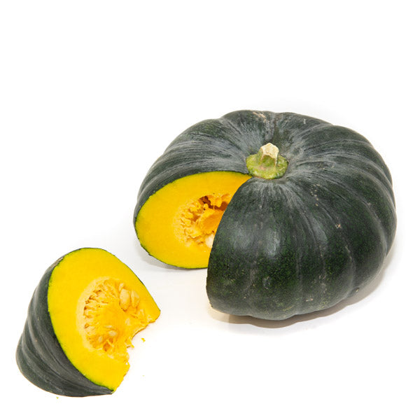 Fresh pumpkin kabocha vegetable from Local Market, single piece with vibrant green and orange skin, ready for cooking or slicing.