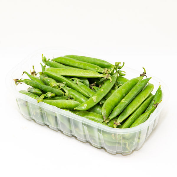 Fresh green peas in pod from Local Market, 0.5 kg pack, showing vibrant peas inside the pods on a white background.