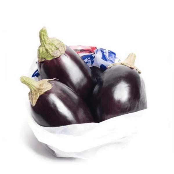 Fresh eggplants in a 1 kg bag from Local Market, showcasing shiny purple vegetables on a white background.