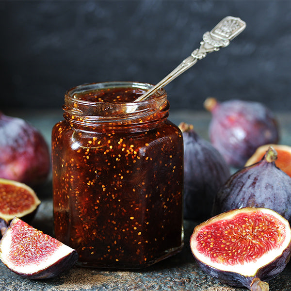 Fresh figs from Local Market, 1 kg pack, showcasing ripe, sweet figs with vibrant purple skin and green stems.