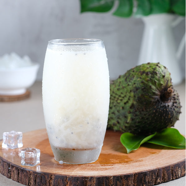 Holland Guanabana fruit, single 2kg piece, fresh tropical fruit with spiky green exterior and white flesh inside.