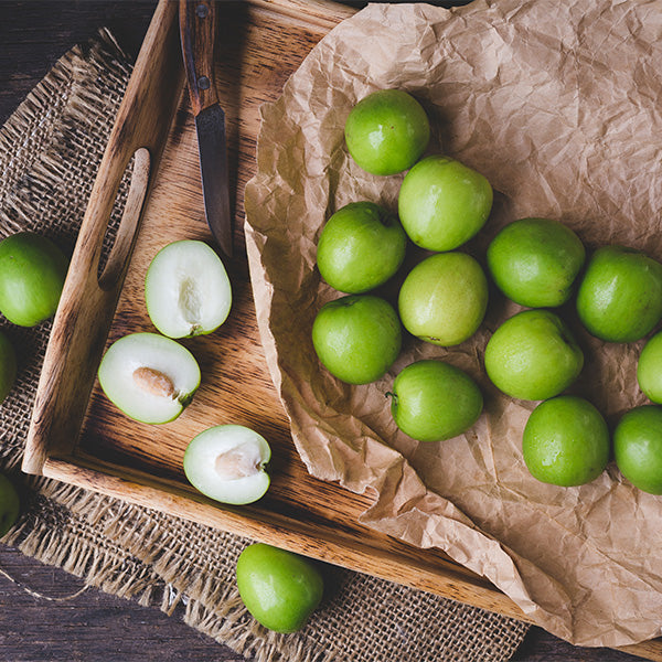 Large 1 kg pack of local market giant jujubes, showing bright red, ripe jujube fruits with smooth skin and glossy appearance.