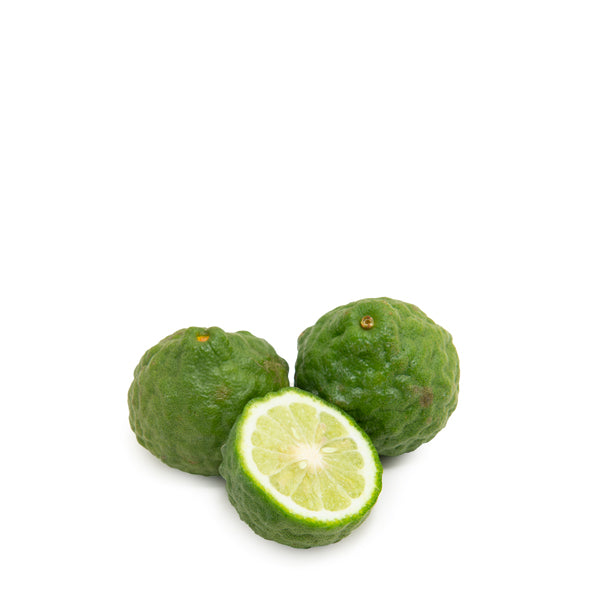 Fresh Thai kaffir limes in a 0.25 kg pack, showcasing vibrant green fruit with textured skin, ideal for cooking and flavoring.