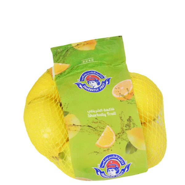 Fresh yellow lemons in a 1 kg bag from Sharbatly, showcasing bright citrus fruit on a clean surface.