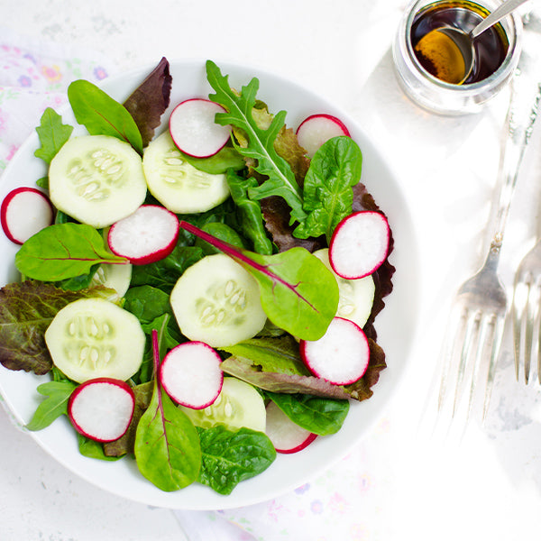 Fresh baby Tatsoi lettuce from Holland in a 0.125 kg pack, showing vibrant green leaves and tender vegetable greens.