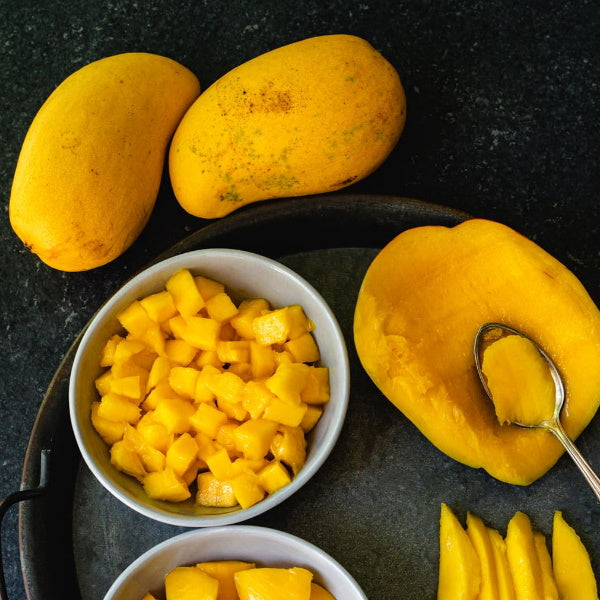 Fresh Badami mangoes from Local Market in a 3 kg carton, showcasing ripe, vibrant orange mangoes ready to eat.