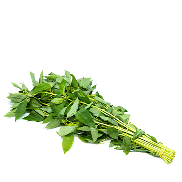 Fresh Molokhia leaves in a 0.25 kg pack, a popular vegetable from Local Market, ready for cooking or garnishing.