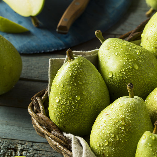 Fresh Anjou pears from Sharbatly, 1 kg pack, showcasing ripe, green pears with smooth skin and natural shape.