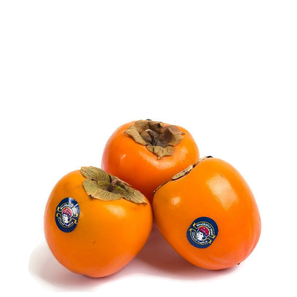 Fresh Sharbatly persimmons in a 4.5 kg carton, showcasing ripe orange kaki fruit with smooth skin and vibrant color.