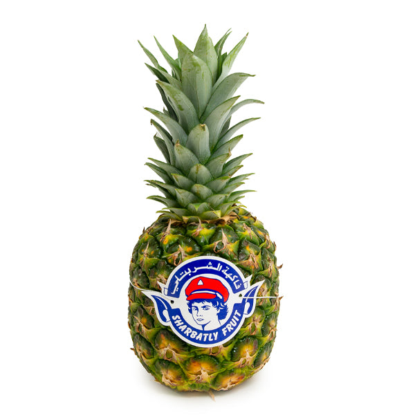 Golden pineapple from Sharbatly, a fresh single piece of tropical fruit with spiky green leaves and bright yellow skin.