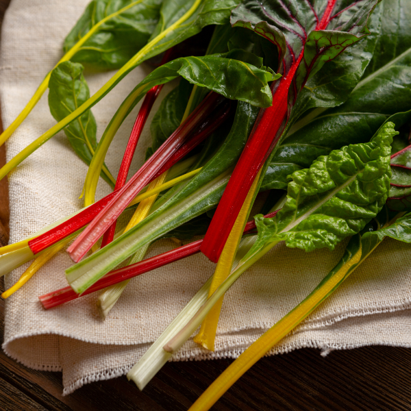 Rainbow Swiss chard bunch from Holland, fresh vegetable with colorful stems and dark green leaves, approximately 0.35 kg.