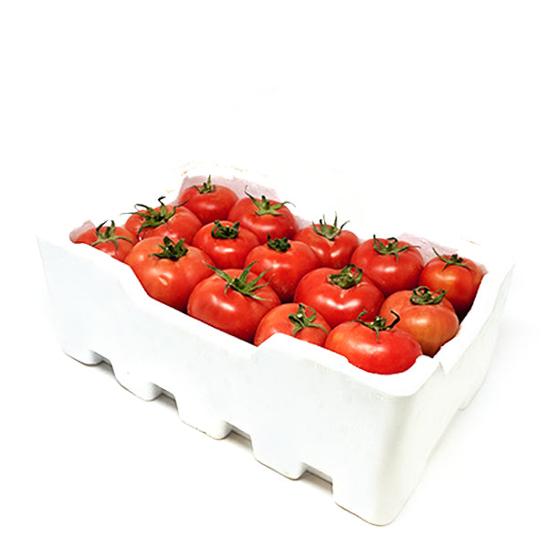 Fresh local tomatoes in a 4.5 kg carton, showcasing vibrant red vegetables from the Local Market brand.
