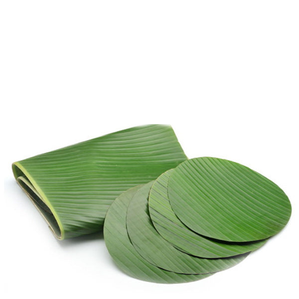 Fresh banana leaves, 1 kg pack from Thailand, vibrant green vegetable for cooking and wrapping.