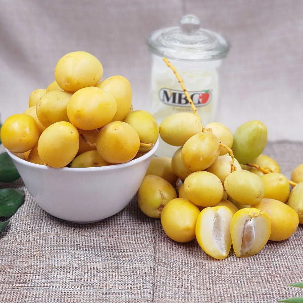 Fresh Barhe dates in a 0.5kg pack from Local Market, showcasing plump, glossy dates with a rich, sweet appearance.