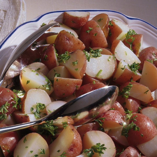 Fresh Holland Cherie Red Potatoes in a 1 kg pack, showcasing smooth, vibrant red skin and firm, healthy vegetable appearance.