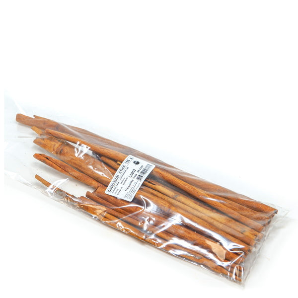 A 0.125 kg pack of aromatic cinnamon sticks, an herbal spice, displayed in a clear package from Local Market.