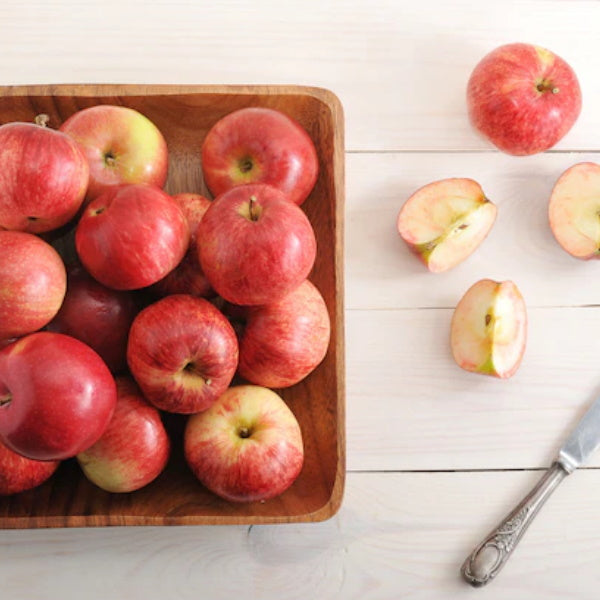 Royal Gala apples in a 3 kg carton by Sharbatly, fresh and vibrant fruit ready for consumption.
