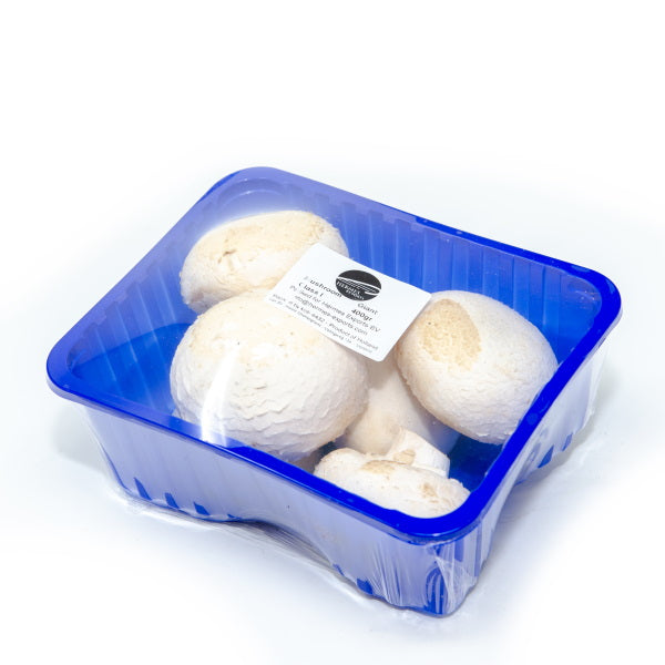 Giant white mushrooms, silver dollar variety, from Holland, in a 0.4 kg pack, fresh vegetable product.