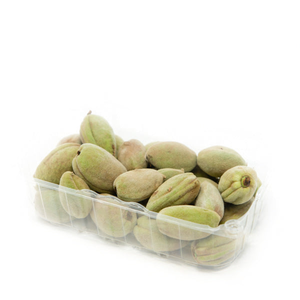 Fresh green almonds in a 0.4 kg pack, showing vibrant green nuts from Local Market's nut selection.