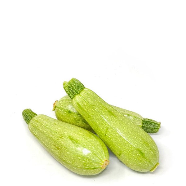 Fresh green jumbo zucchini from Local Market, large courgettes in a 2 kg pack, showcasing their smooth skin and vibrant color.