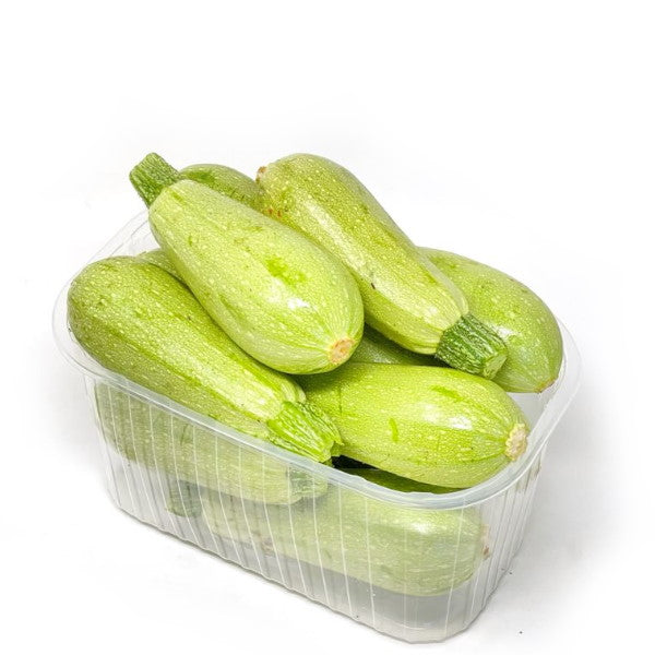Green jumbo courgettes from Local Market, fresh zucchini vegetables in a 2 kg pack, with smooth skin and vibrant color.