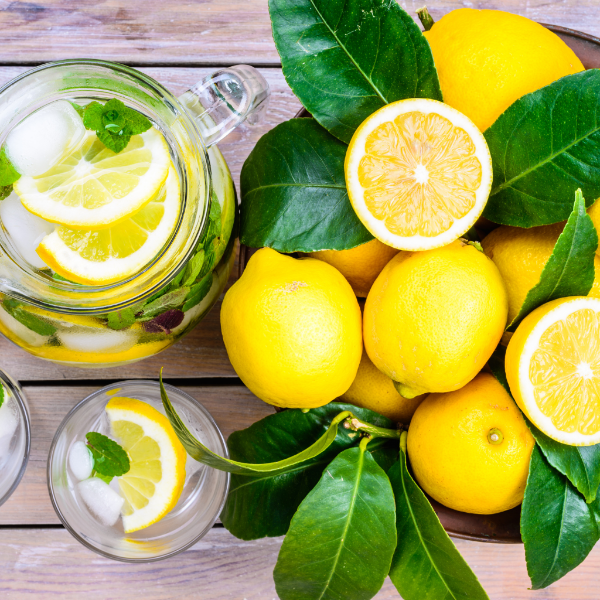 Fresh yellow lemons from Sharbatly in a 1 kg bag, showing vibrant citrus fruit with textured skin.