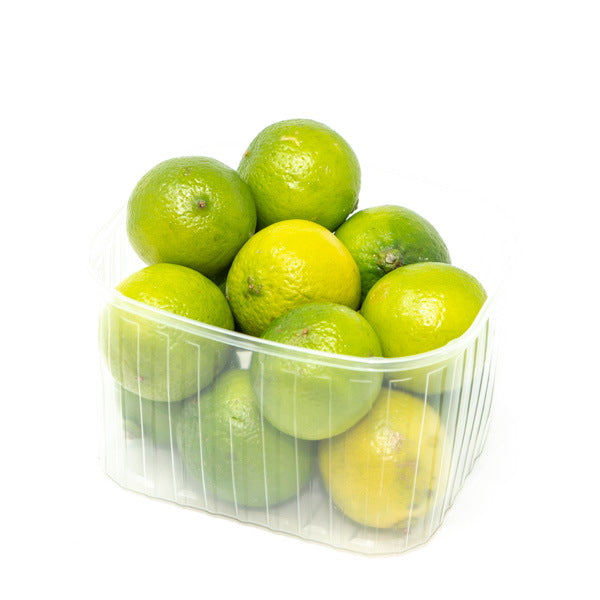 Fresh seedless limes from Local Market in a 1 kg pack, showcasing vibrant green citrus fruit on a white background.