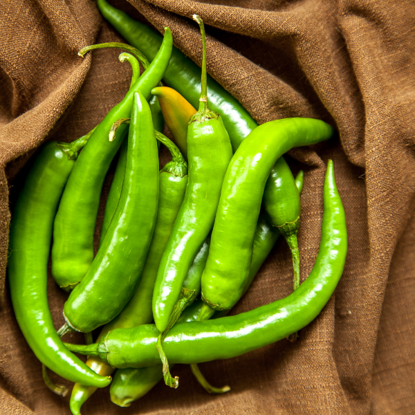 Fresh green chili peppers from Local Market, 0.3 kg pack, vibrant and crisp vegetables perfect for cooking and adding spice.