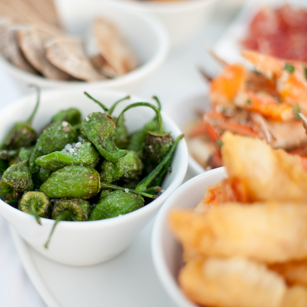 Holland shushito and pimiento Padron peppers, small green chili vegetables in a 0.3 kg pack, fresh and vibrant.