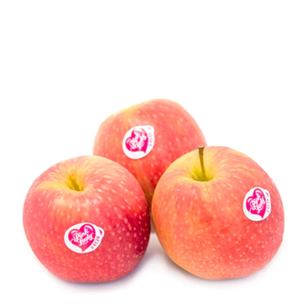 Pink Lady apples from Sharbatly in a 0.65 kg pack, fresh and vibrant pink-colored fruit on display.