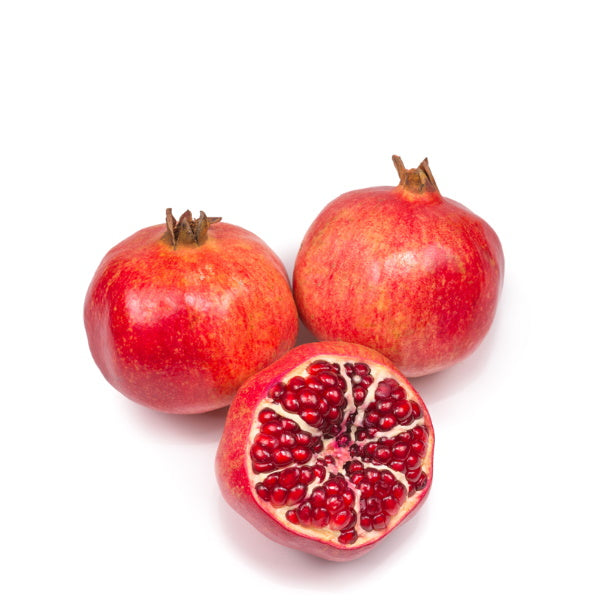 Fresh Wonderful pomegranates in a Sharbatly 3.8 kg carton, showcasing vibrant red fruit ready for fresh consumption.