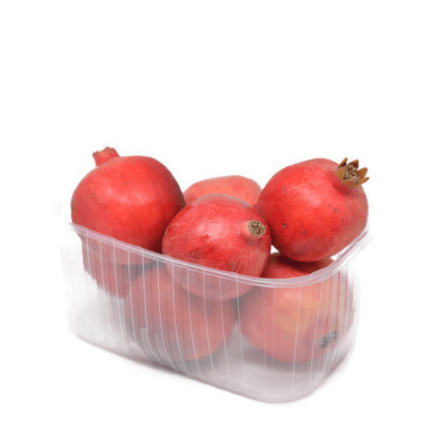 Fresh pomegranates from Local Market in a 2 kg carton, showcasing bright red, round fruit with smooth skin.
