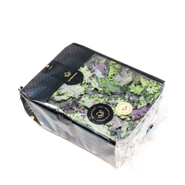 Fresh baby purple kale, a superfood vegetable from Holland, shown in a 0.125 kg pack with vibrant purple leaves.