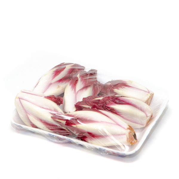 Belgian Endive Chicory in a 0.5 kg Holland branded pack, showcasing fresh, red and white vegetable with crisp leaves.
