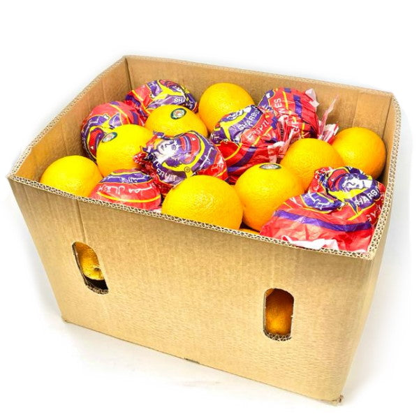 Fresh Valencia oranges in a 14 kg carton by Sharbatly, ideal for making juice, with bright orange skin and lush foliage.