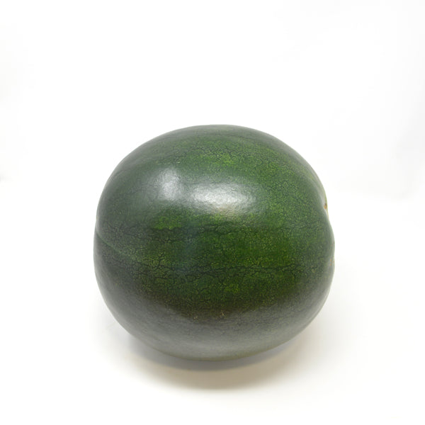 Fresh single piece watermelon from Sharbatly, showcasing vibrant red flesh and green rind, perfect for a healthy snack.