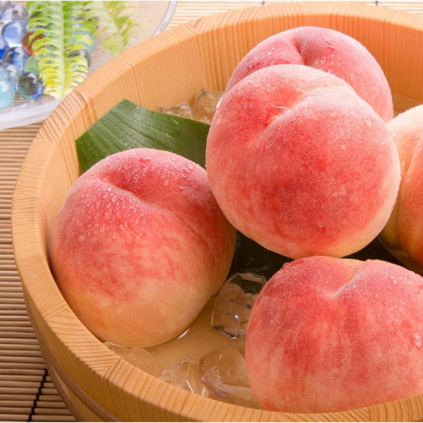 White peaches from Sharbatly in a 1 kg pack, showcasing fresh, ripe fruit with smooth white skin and juicy interior.